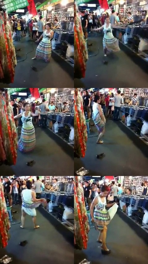 대만 가오슝시 루이펑 야시장에서 춤을 추는 40대 여성./유튜브 동영상 캡처