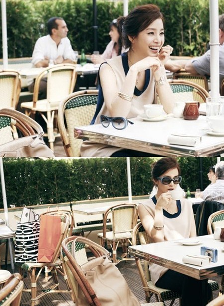 화보 촬영에서 선글라스를 썼다가 벗은 김태희./온라인 커뮤니티