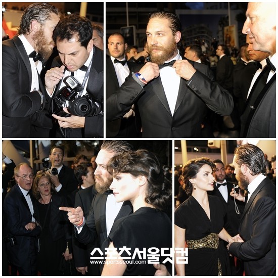 할리우드 톱배우 톰 하디가 약혼녀 샬롯 라일리를 위해 사진기자를 섭외해 사진촬영을 하고 있다. /칸= 배정한 기자