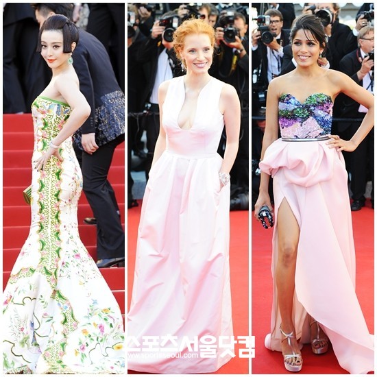 배우 판빙빙과 제시카 차스테인, 프리다 핀토(왼쪽부터)가 프랑스 칸에서 열린 레드카펫 행사에 참석해 우아한 드레스를 입고 포즈를 취하고 있다. / 배정한 기자