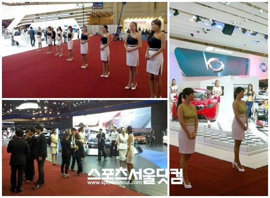 관람객을 맞이 하기 위해 부산모터쇼 각 부스의 레이싱걸들이 준비를 하고 있다.