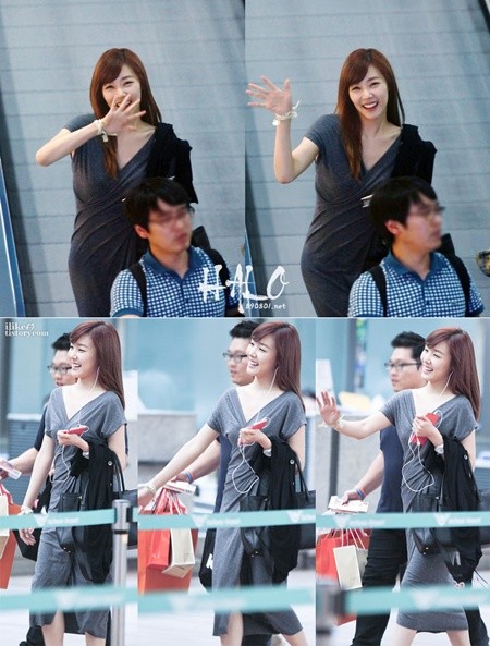 원피스를 입고 완벽한 보디라인을 드러낸 티파니가 환한 미소를 지으며 팬들에게 인사하고 있다./온라인 커뮤니티