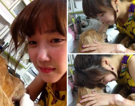 낸시랭이 애완견이 죽었다는 소식을 전하며 죽은 애완견과 함께 찍은 사진을 올려 논란이 되고 있다./낸시랭 트위터