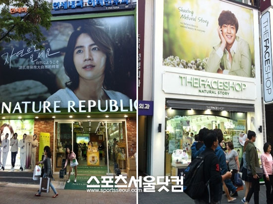 명동 화장품 가게들은 간판보다 한류 연예인 사진을 더 크게 걸어놨다.  / 문지현 인턴