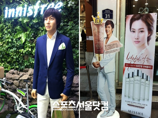 (왼쪽)이니스프리 매장내 이민호 밀랍인형을 설치해 뒀다. (오른쪽)미샤 명동점 앞 모델 유노윤호의 전신 사진이 꾸며져 있다. /문지현 인턴