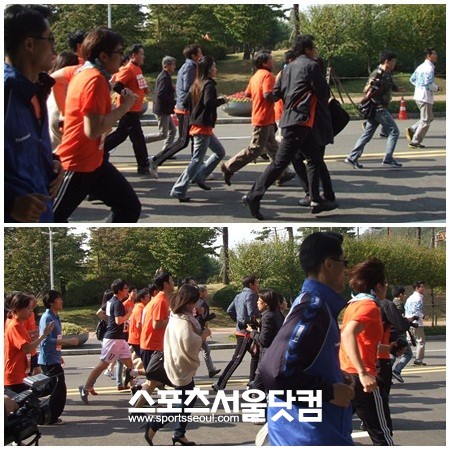 무소속 안철수 대선 후보가 속도를 내서 달리기 시작하자 그를 따르던 경호원과 취재진, 마라톤 참가자들이 깜짝 놀랐다.