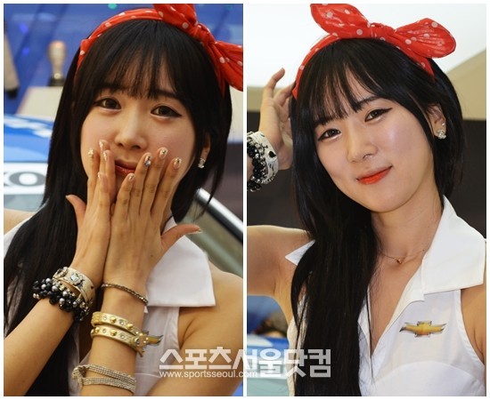 30일 경기도 고양시 일산 킨텍스 전시장에서 열린 2013 서울모터쇼에서 레이싱 모델이 차량 옆에서 다양한 포즈를 취하고 있다./고양=황준성 기자