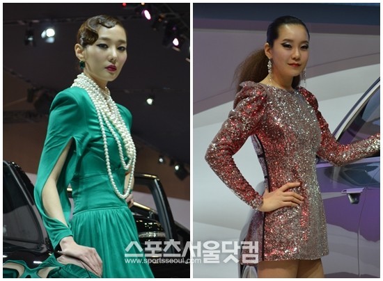 30일 2013 서울모터쇼에서 레이싱 모델들이 차량 옆에서 우아한 자태를 뽐내고 있다.