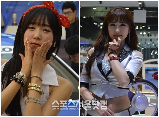 30일 2013 서울모터쇼에서 레이싱 모델들이 차량 옆에서 귀여운 포즈를 취하고 있다.