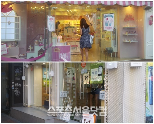 13일 홍대 거리의 화장품 가게들이 비닐 문을 만들어 에어컨 바람이 새어 나가지 못하도록 만들어놨다. / 박지혜 인턴기자