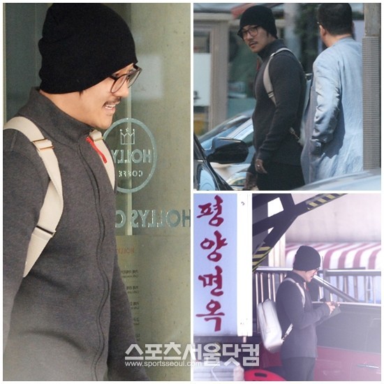 휴대전화 사용, 이제는 합법입니다!- 밝은 표정의 가수 KCM이 휴대전화를 사용하고 있다.