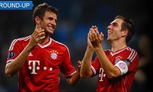 바이에른 뮌헨의 토마스 뮐러(왼쪽)와 필립 람이 3일 열린 2013~2014시즌 유럽축구연맹 챔피언스리그 조별리그 D조 2차전 맨체스터 시티와 원정 경기에서 승리한 뒤 기뻐하고 있다. / uefa.com