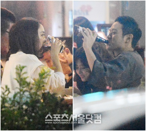 시원한 맥주를 마시며 부산의 밤을 즐기고 있는 김민정(왼쪽)과 천정명./최진석 기자