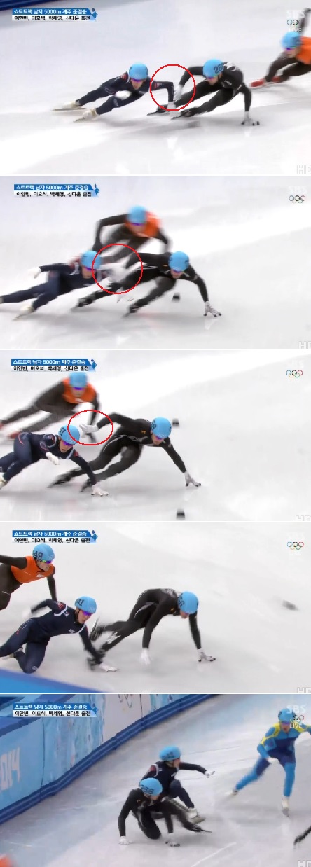 이호석이 13일 러시아 소치의 아이스버그 스케이팅 팰리스에서 열린 2014 소치 동계올림픽 쇼트트랙 남자 5000m 계주 준결승에서 코너를 돌다가 미국 선수의 반칙성 플레이에 넘어지고 있다. / SBS 방송 캡처