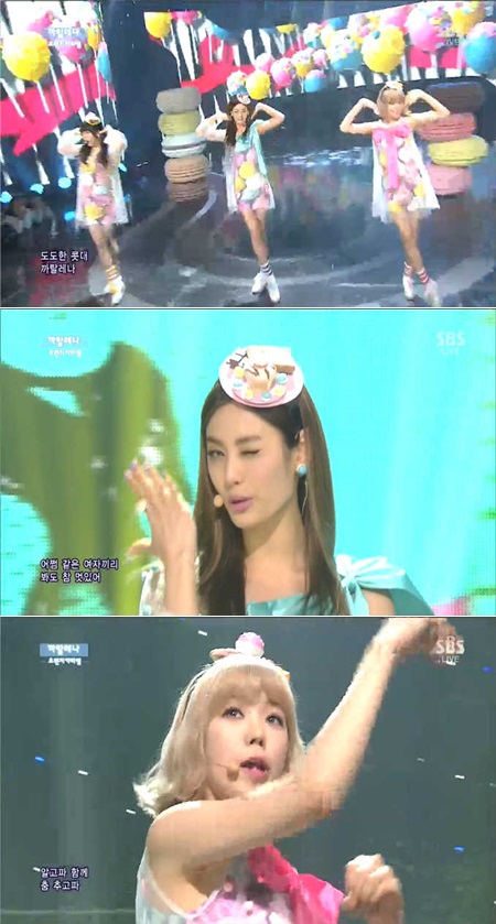 오렌지캬라멜이 인기가요에서 재밌는 의상을 입고 까탈레나를 부르고 있다. / SBS 인기가요 방송 캡처