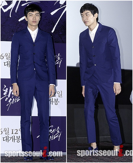 남색 정장에 흰 셔츠를 입은 이민기. 독특한 머리스타일이 눈에 띈다./최진석기자