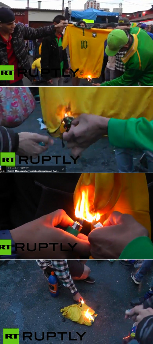 브라질 팬들이 9일 브라질 월드컵 4강전 독일과 경기에서 1-7로 패한 뒤 네이마르 다 실바의 유니폼을 불 태우고 있다. / 유튜브 영상 캡처