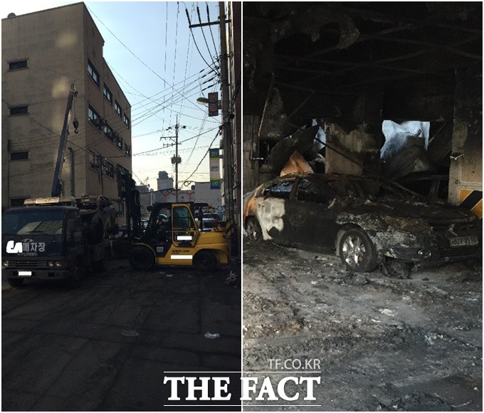 23일 오전 의정부 아파트 화재현장에서 폐차 수거업체가 불에 탄 승용차를 옮기고 있었다. 일부 주민은 이를 바라보며 깊은 한숨만 내쉬었다./대봉그린아파트=황신섭 기자