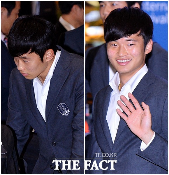 고개를 숙이고 무표정하게 1일 인천국제공항에 들어선 김진수가 팬들의 환호에 미소를 되찾았다. / 인천국제공항 = 김슬기 기자