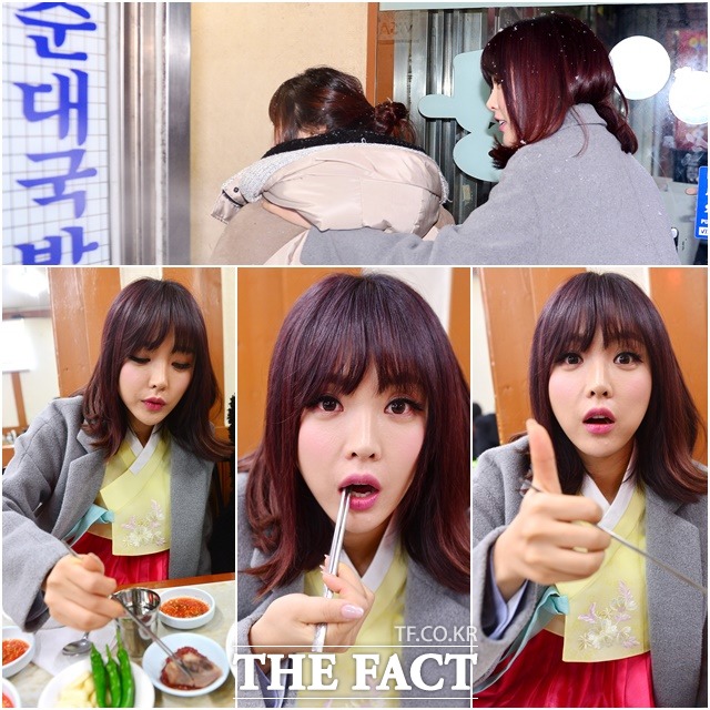 여기 머릿고기 대박  홍진영이 뜨끈한 고기를 먹고 감탄하고 있다. /남윤호 기자