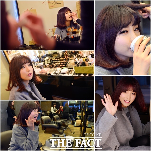 오전에도 충전되는 홍진영 표 비타민  홍진영이 본격적인 스케줄 시작 전 헤어숍에서 꽃단장하고 있다. /남윤호 기자