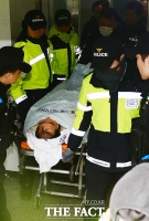 [TF포토] '미국 대사 피습' 김기종, '간이 침대에 누워 경찰서로'
