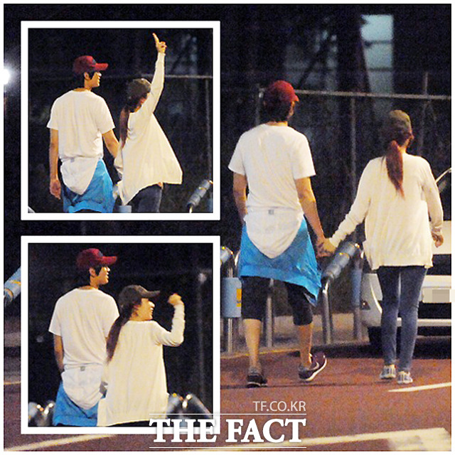 흰색 상의에 모자를 나란히 쓰고 데이트를 즐기는 지현우-유인나 커플.