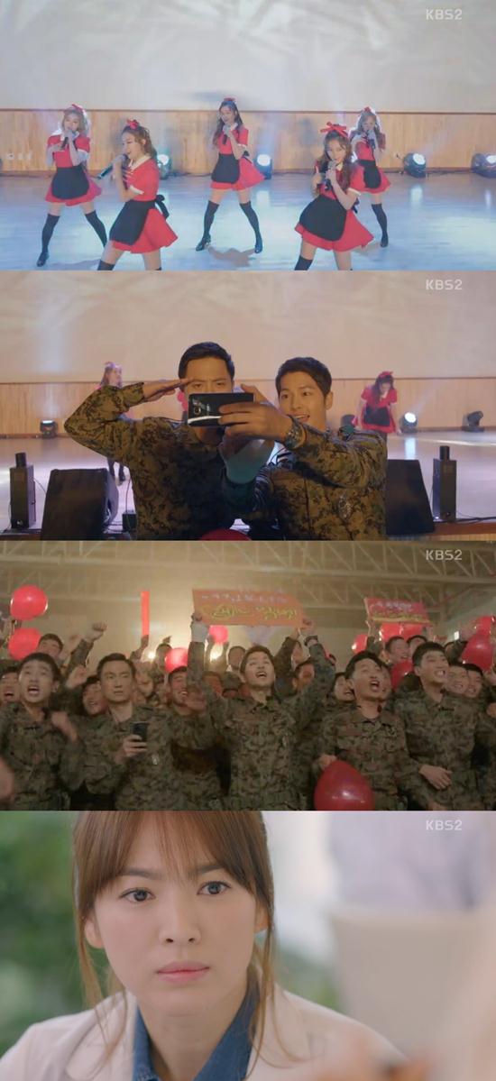 레드벨벳 무대에 흠뻑 빠진 송중기 진구. 14일 오후 방송된 KBS2 태양의 후예에서는 그룹 레드벨벳이 위문 공연 무대를 펼쳤다. /KBS2 태양의 후예 방송 화면 캡처