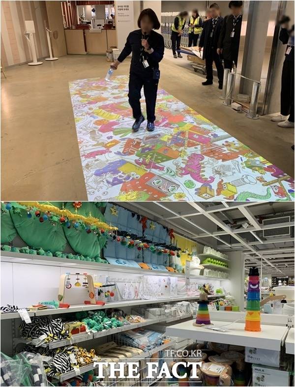 기흥점은 주변 상권에 어린아이를 키우는 고객이 많다는 점을 바탕으로 어린이 체험형 공간도 대폭 늘렸다. 로비 앞으로 점프해 색칠놀이를 즐길 수 있는 빔프로젝터가 설치돼 있다. /기흥=이민주 기자