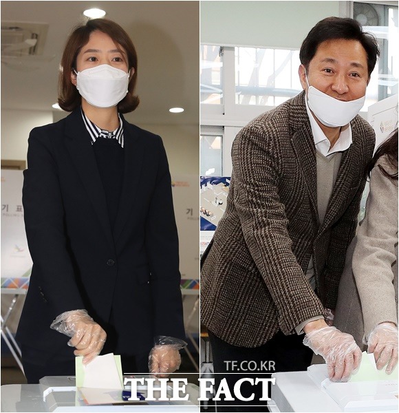 제21대 국회의원 선거일인 15일 오전 광진을에 출마한 고민정 더불어민주당 후보(왼쪽)와 오세훈 미래통합당 후보가 각각 광진구민방위교육센터와 신양초등학교에서 투표하고 있다. /김세정 기자