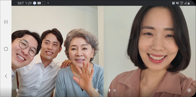 SK텔레콤의 그룹영상통화 솔루션 미더스를 활용해 가족들이 추석 인사를 전하고 있다. /SK텔레콤 제공