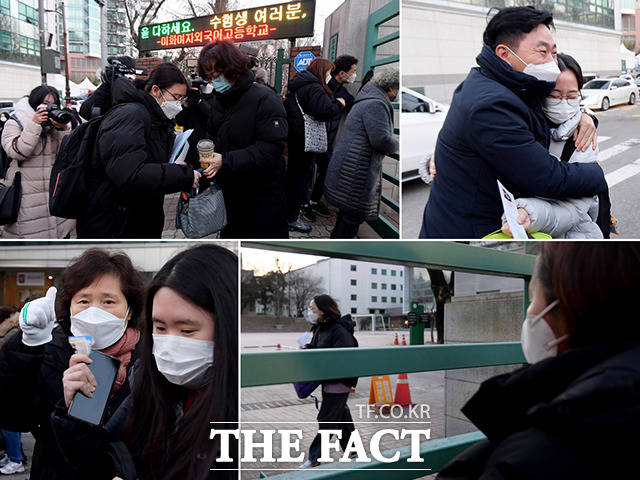 2021년도 대학수학능력시험일인 3일 오전 서울 중구 이화여자외국어고등학교의 수험생들이 가족의 배웅을 받으며 시험장 안으로 들어서고 있다. /이선화 기자