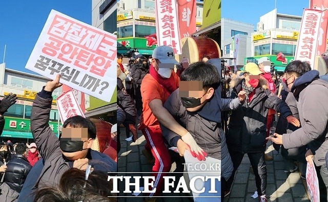 24일 오후 경기도 수원시 팔달문에서 경기인천대학생진보연합 학생들이 윤석열 대선 후보를 규탄하는 내용의 피켓을 들고 있다. 윤 후보의 지지자들은 피켓을 뺏거나 부러트려 시위 행동을 진압했다. /수원=신정인 인턴기자