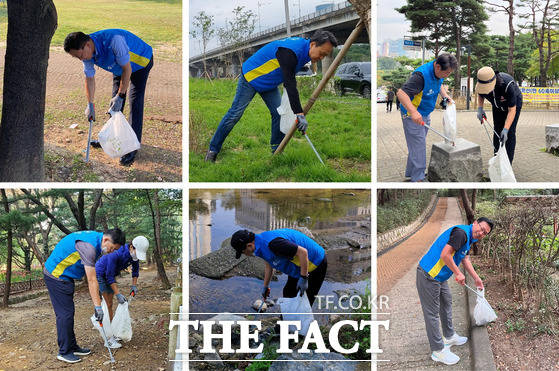 진옥동 신한은행장(사진 위쪽 가운데) 등 신한은행 임원들이 플로깅 자원봉사를 하는 모습. /신한은행 제공