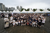  상상인그룹 임직원, '어울림 마라톤 대회'서 시각장애인과 동행