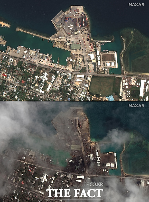 통가 수도 누쿠알로파의 주요 항만 시설이 화산재에 덮혀 있다. /누쿠알로파=AP.뉴시스