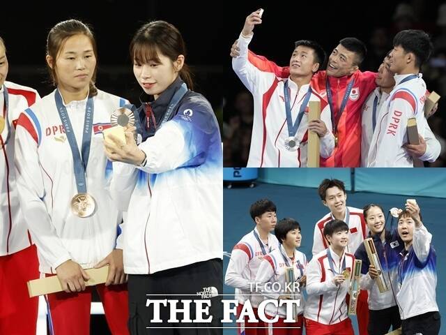 국제올림픽위원회(IOC)는 북한 선수단이 삼성전자 스마트폰을 수령했다고 밝혔다가 사실이 아니라고 정정했다. 외교부는 IOC의 입장 번복 전까지 북한이 해당 스마트폰을 받았다는 전제로 입장을 내놨다. 사진은 2024 파리 올림픽 메달 시상식에서 북한 선수들이 삼성전자 스마트폰으로 기념 촬영을 하는 모습. /뉴시스