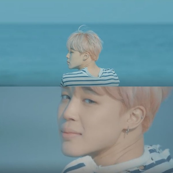 봄날은 일렉트로닉 사운드가 결합된 얼터너티브 힙합곡이다. 영상 속 지민은 핑크 헤어와 청량한 패션으로 따뜻한 느낌을 내뿜고 있다. /뮤직비디오 캡처