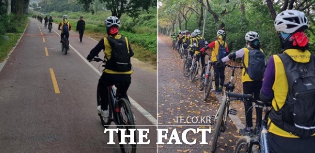 자전거 교육 참가자들이 시내 단체 라이딩을 하고 있다./안양시