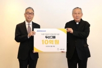  박지원 두산그룹 부회장, '바보의 나눔'에 성금 10억 전달