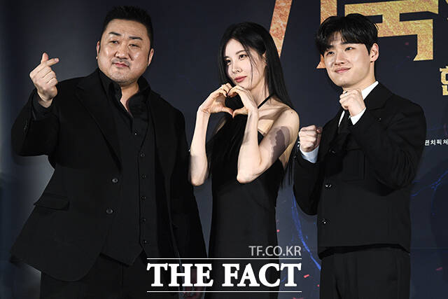 배우 마동석 서현 이다윗(왼쪽부터)이 연기 호흡을 맞춘 영화 거룩한 밤: 데몬 헌터스가 오는 30일 개봉한다. /서예원 기자