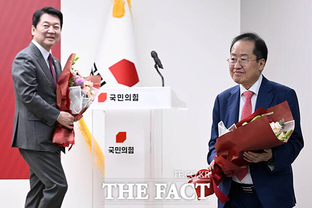 3차 경선 진출에 실패한 안철수 후보와 홍준표 후보.