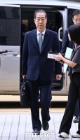  '내란 방조 혐의' 한덕수, 구속심사 위해 법원 출석 [포토]