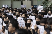  금감원 '검은 옷'의 항의…금소원 분리·공공기관 지정, 왜 반대하나