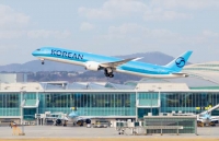  대한항공·아시아나, 탑승 마일리지 1대1…합병 후 10년 유지