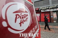  차액가맹금 패소·회생계획안 연장…먹구름 짙어진 '피자헛'