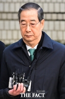  '내란 사건 첫 선고' 출석하는 한덕수 [포토]