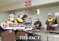  오비맥주, 설 맞아 '명동밥집'서 배식 봉사…소외계층에 온기 전달