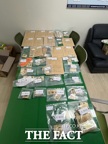 금품을 수수한 조합원 명단과 살포 전후 현금 뭉치. /예천경찰서