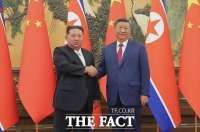  김정은, '재추대 축하' 시진핑 축전에 답전…